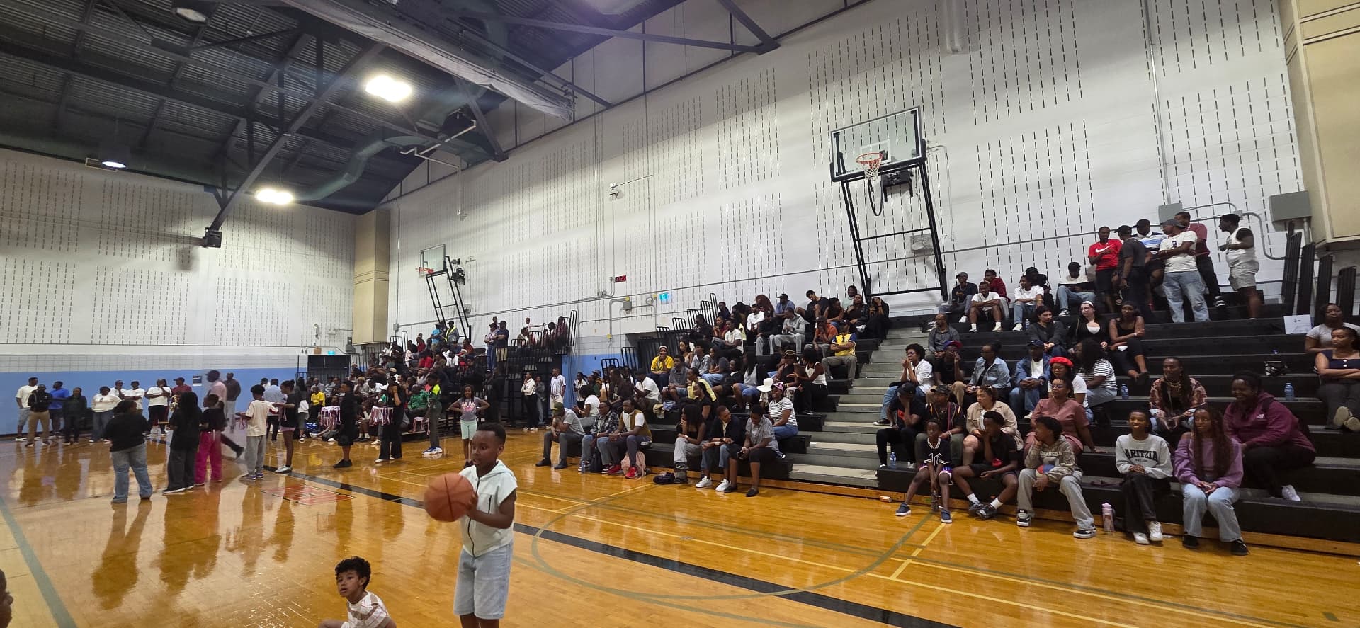 Families cheering from the stands at the ASSA competition